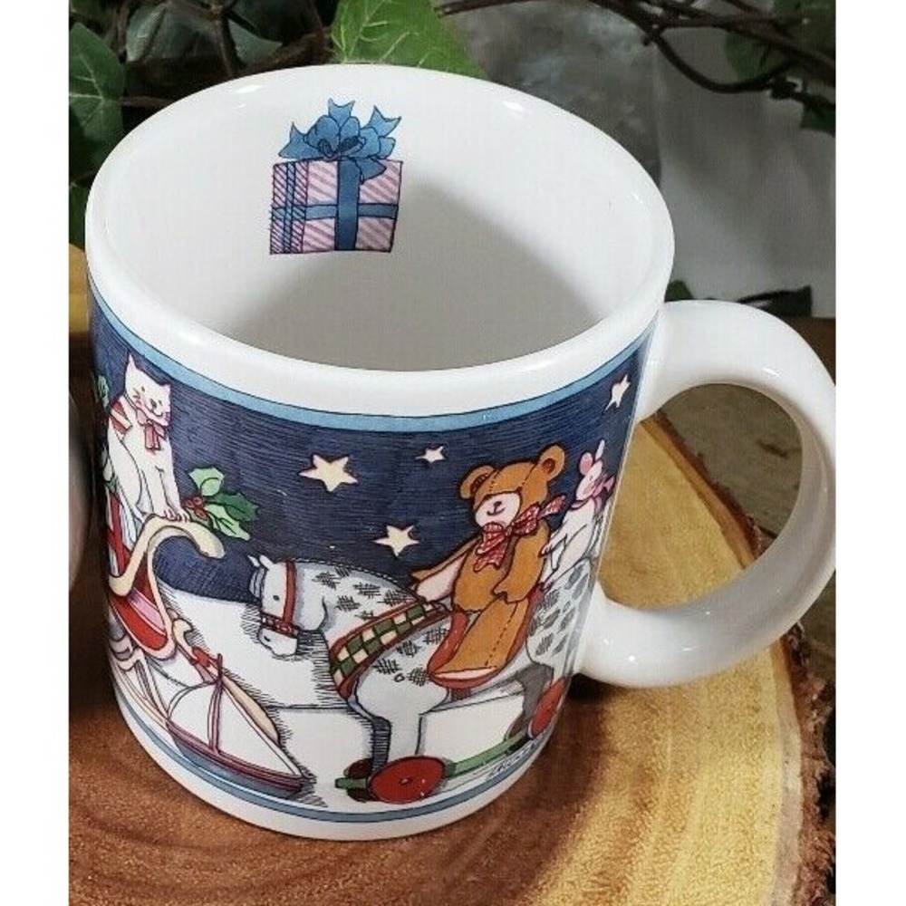 A Susan Winget Christmas Holiday Mug Covered with Toys